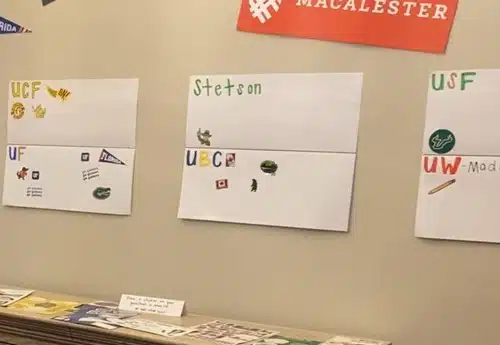 Posters with different college names on them